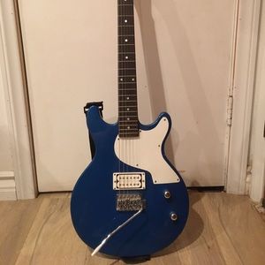 Blue and white electric guitar